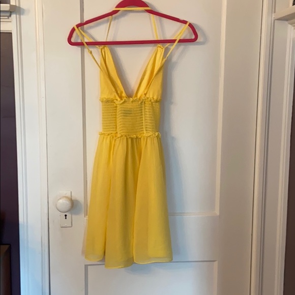 Strappy yellow Bebe mini dress - Picture 3 of 4